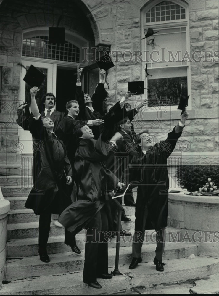 1984 Press Photo Carroll College Graduates Throwing Caps- Historic Images