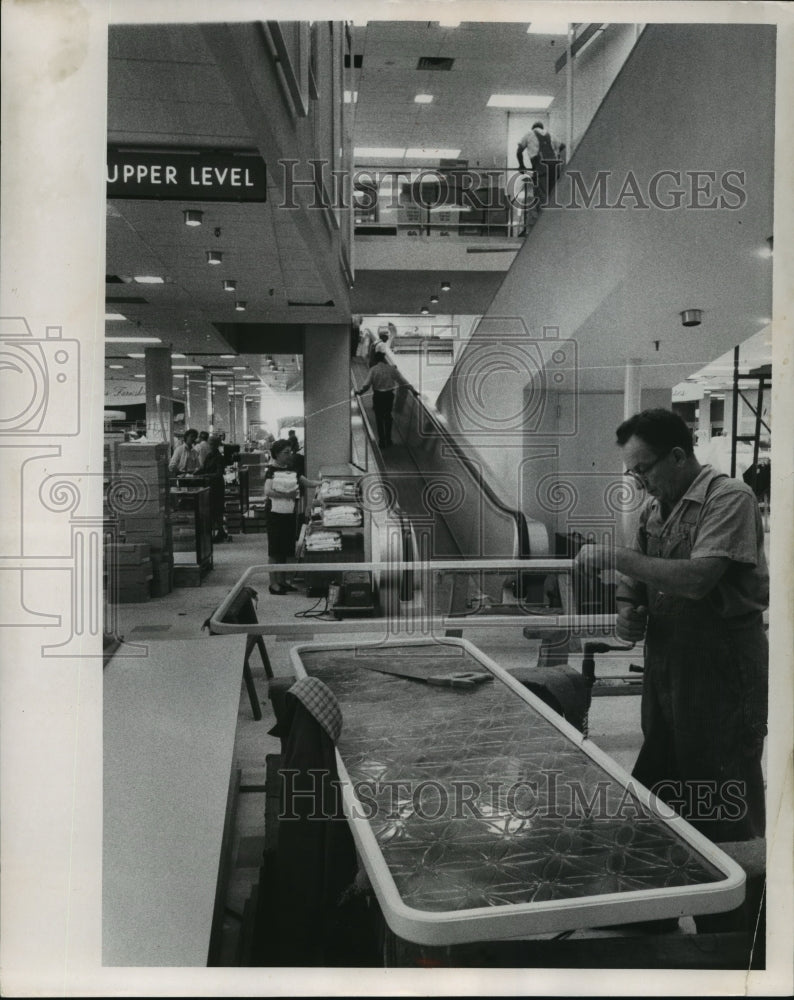 1962 Press Photo Workmen and Clerks put finishing touches on Boston village.- Historic Images