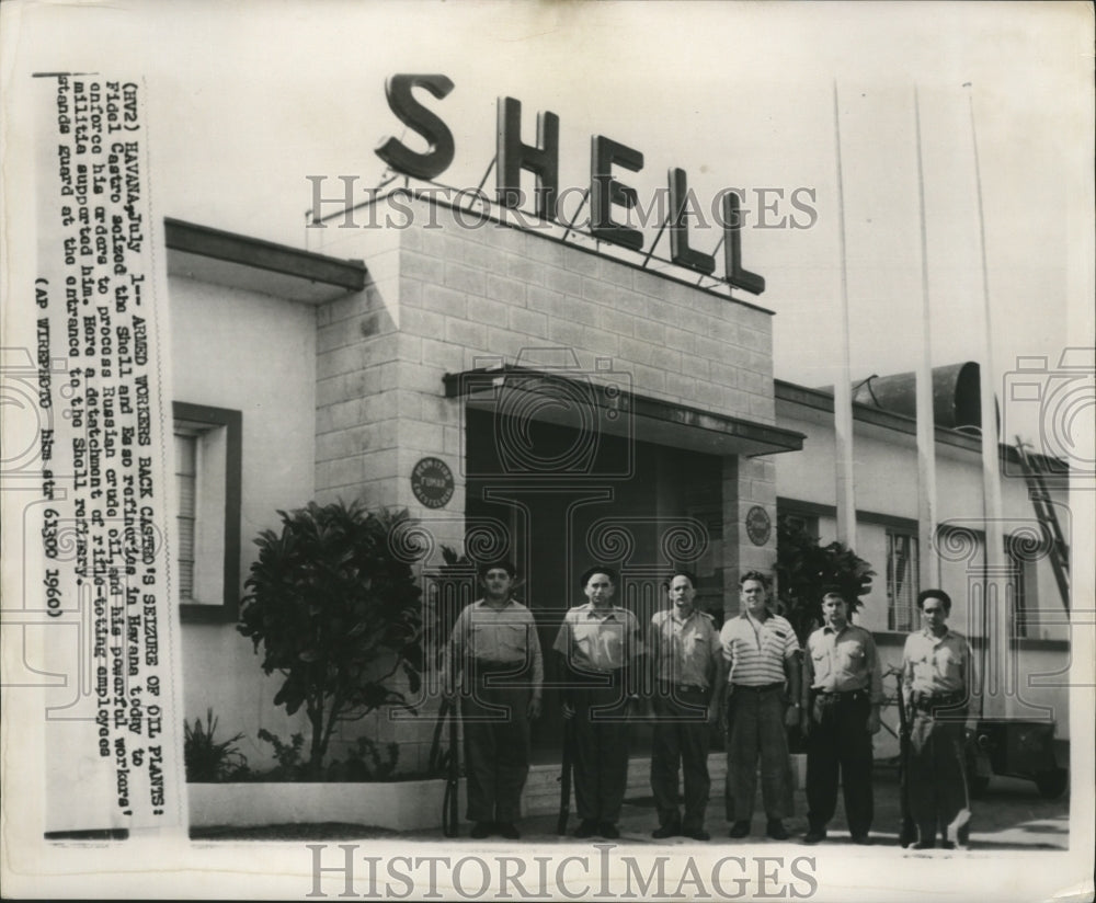 1960 Press Photo Rifle-Toting Employees Stand Guard at Shell Refinery in Havana