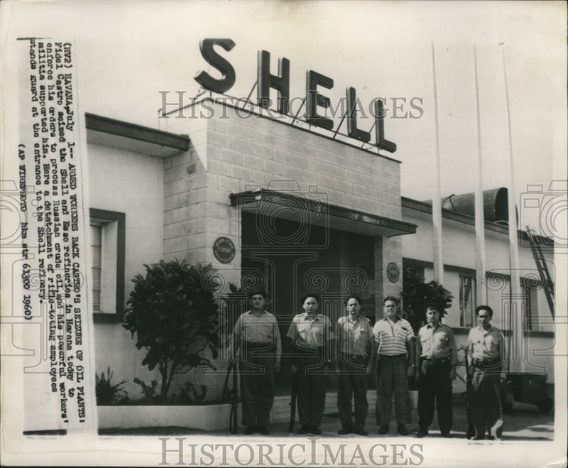 Load image into Gallery viewer, 1960 Press Photo Rifle-Toting Employees Stand Guard at Shell Refinery in Havana
