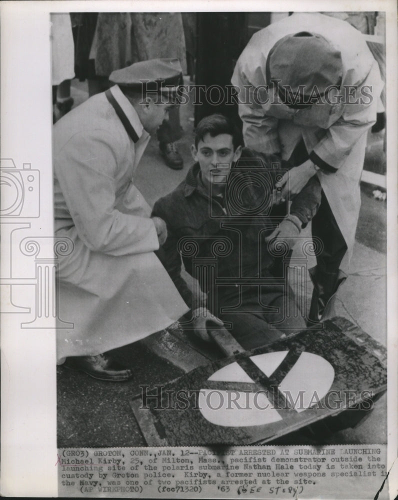 1963 Press Photo Pacifist Michael Kirby being arrested at submarine launch- Historic Images