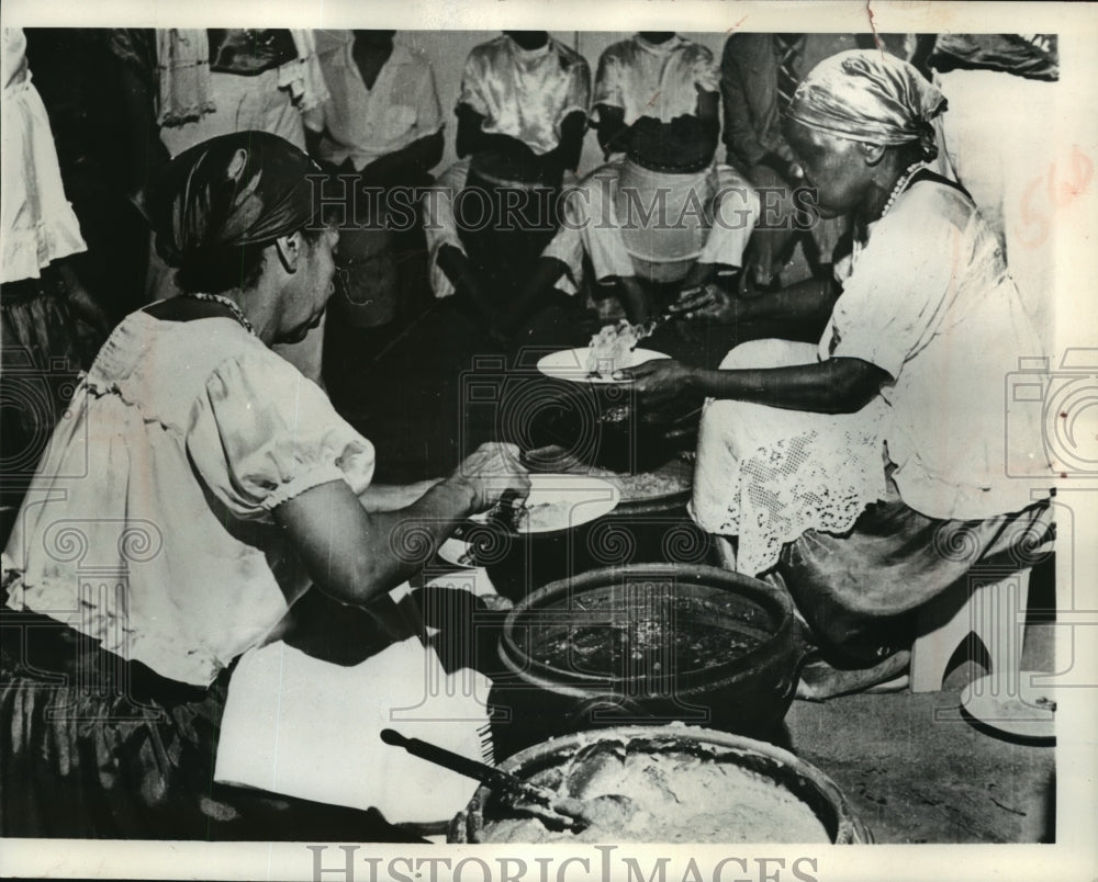 1956 Press Photo Brazilians share a special meal after performing a ritual- Historic Images