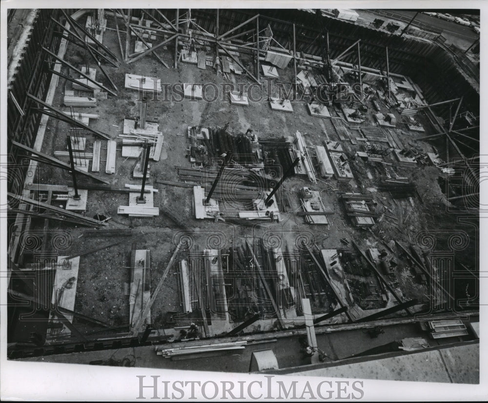 1960 Press Photo Supplies line the ground at building construction site- Historic Images