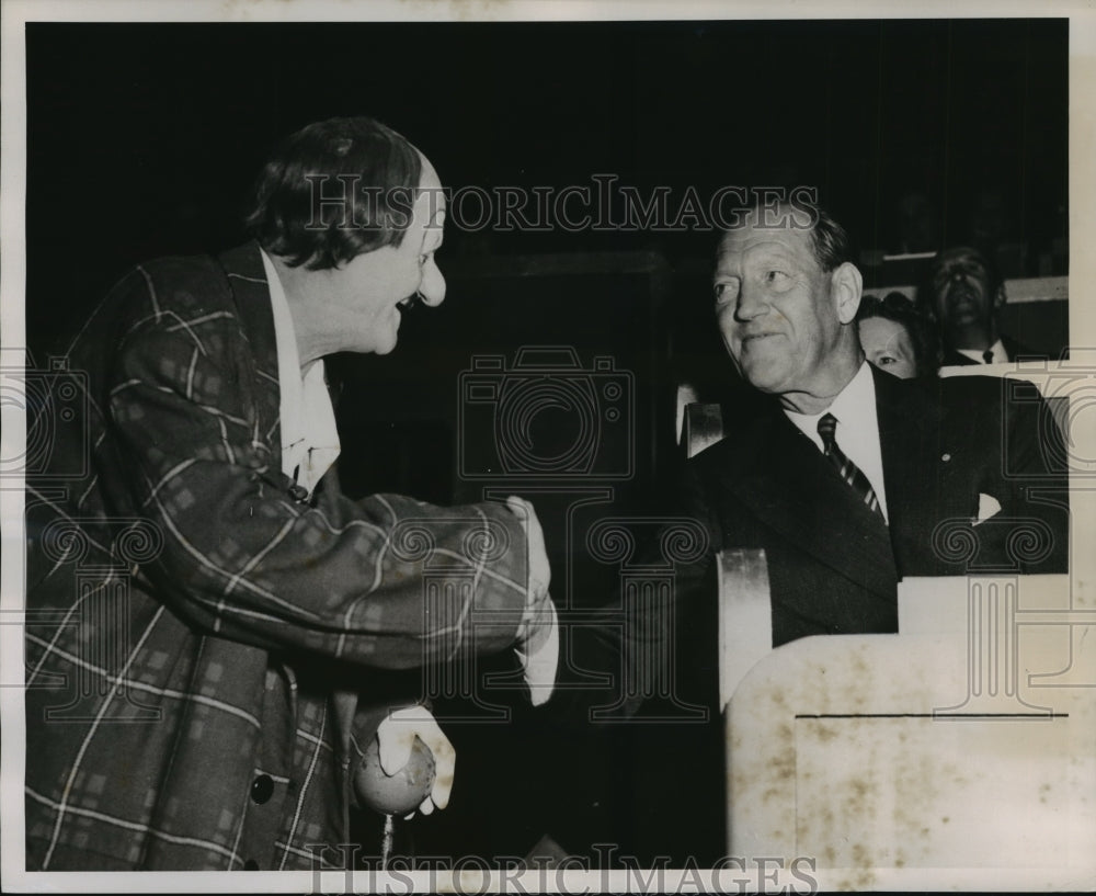 1954 Press Photo Prince Axel of Denmark shake hands with world famous clown Coco- Historic Images