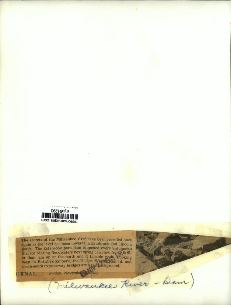 1963 Press Photo Estabrook park dam opening lowers level of Milwaukee River