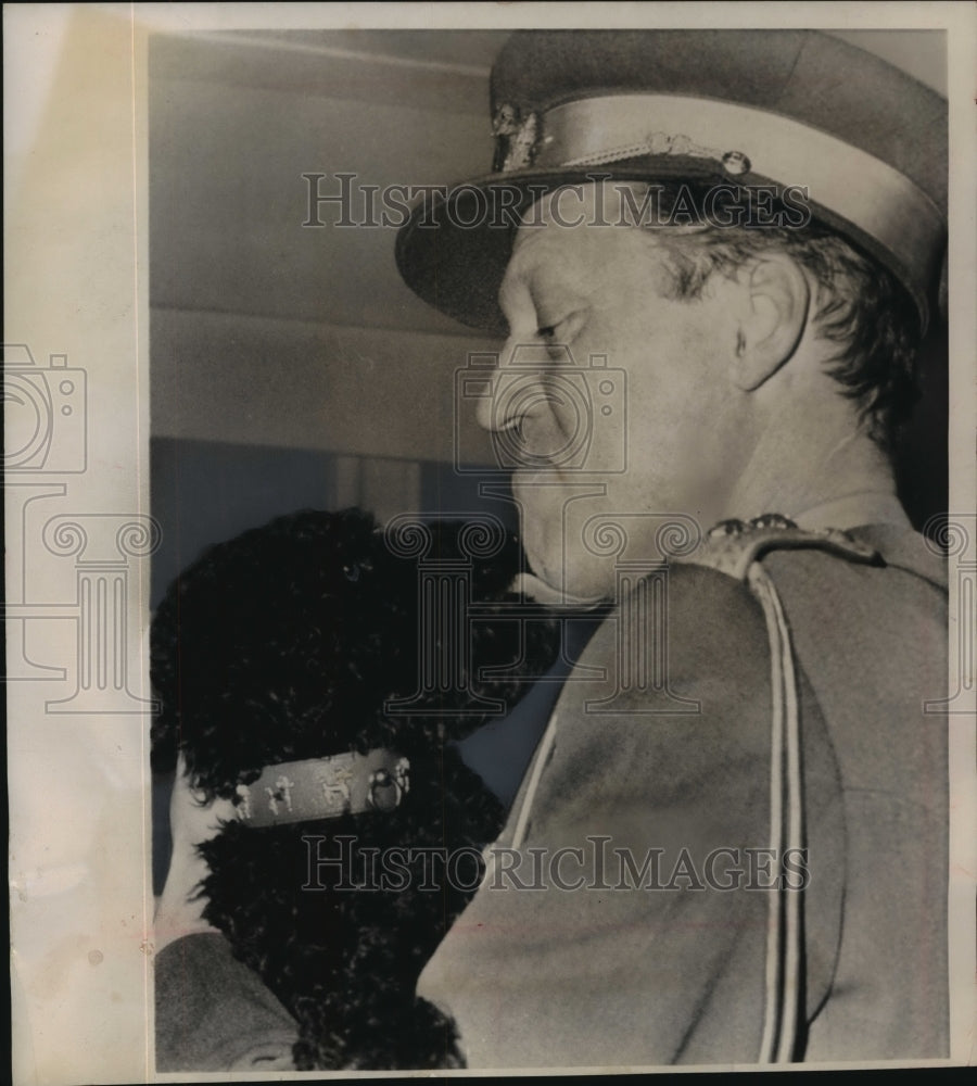 1963 Press Photo A black poodle licks Denmark&#39;s Prince Georg in Thetford England- Historic Images