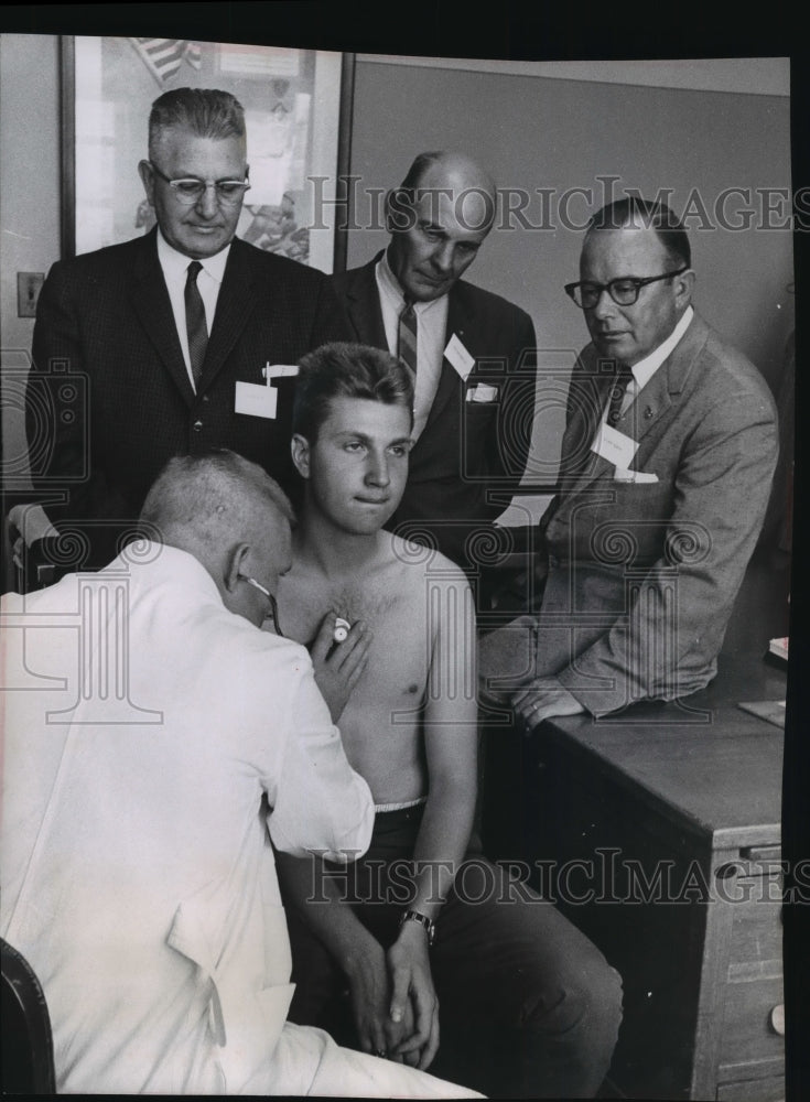 1962 Press Photo Robert Scacht is examined by a doctor - mja96469