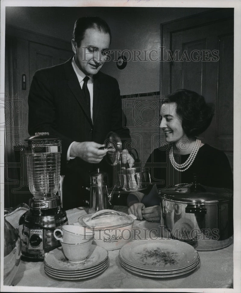 Load image into Gallery viewer, 1963 Press Photo Attorney Kenneth J. Dunlap and Miss Marie Janowski - mja96587
