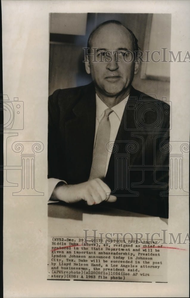 1963 Press Photo Angier Biddle Duke sits at desk - mja96609- Historic Images