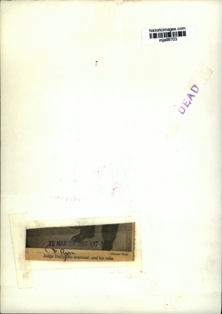 1967 Press Photo Judge F. Ryan Duffy, his overcoat and his robe - mja96703