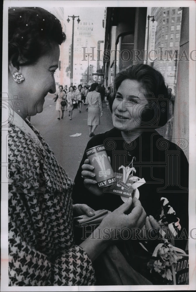 1955 Press Photo Student Angela Magestro buys an Easter Seal Society's Lily Tag