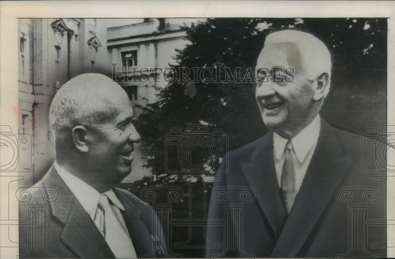 Load image into Gallery viewer, 1958 Press Photo Cyrus Eaton industrialist visiting with another man - mja98888
