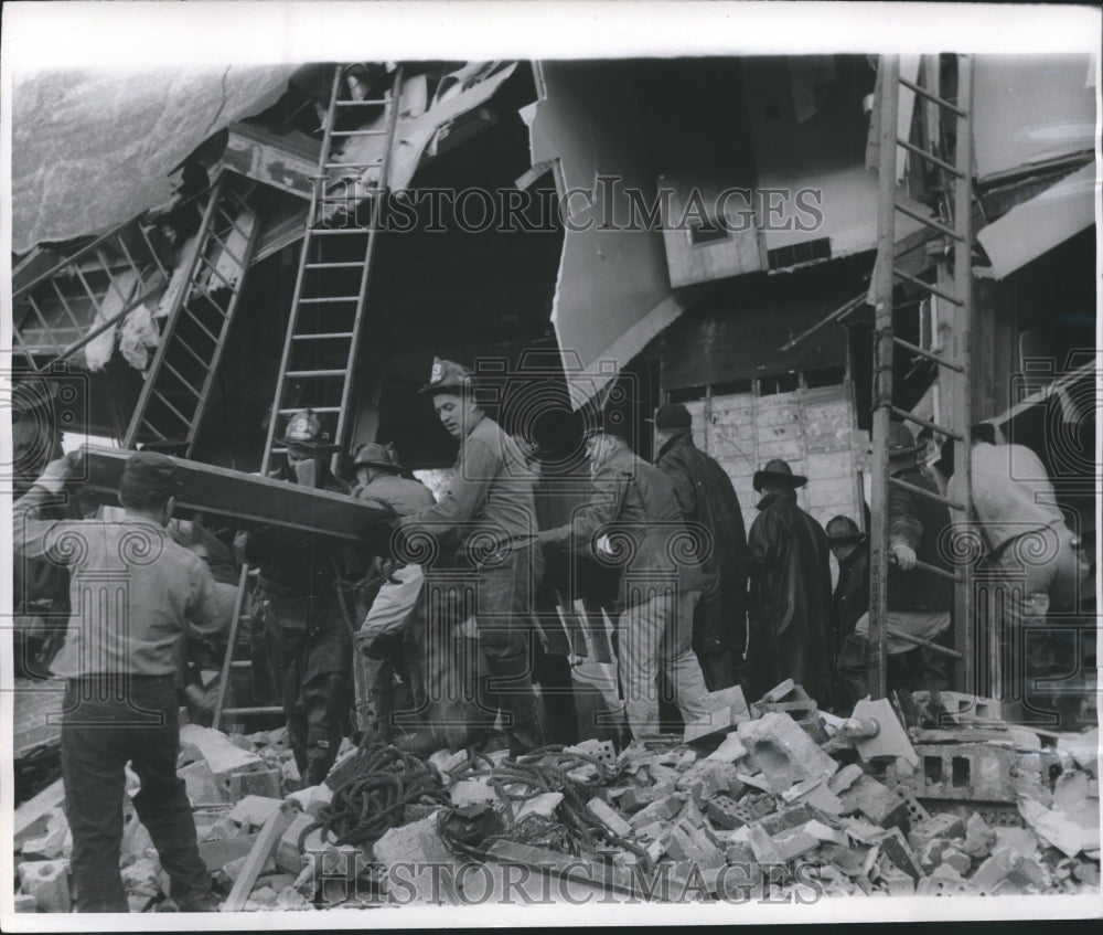 1956 Press Photo Milwaukee Fireman Work to Clear Rubble- Historic Images