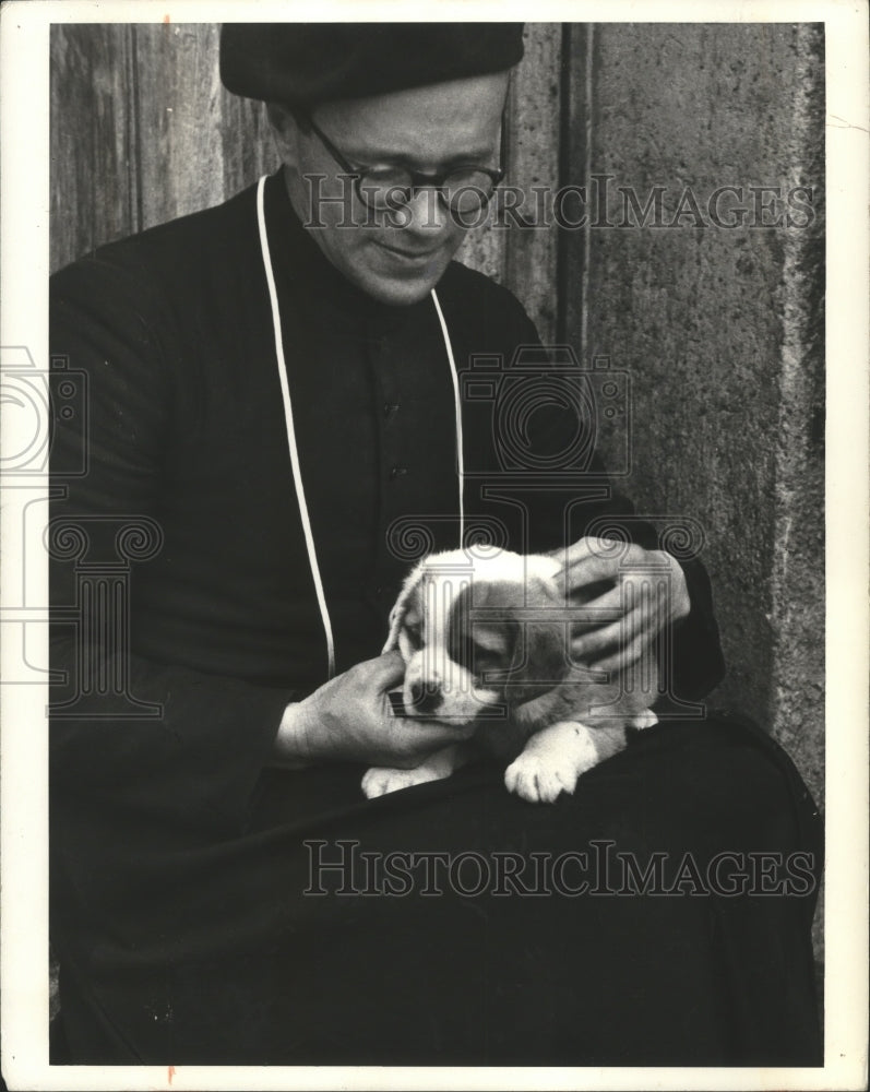 1973 Press Photo Priest Canon Bernard Rausis With Saint Bernard Puppy- Historic Images