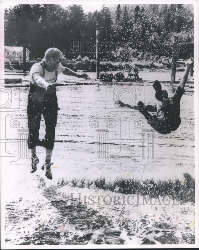 1964 Press Photo Jute Wickheim Defeats Another Logrolling Challenger - mjb07424- Historic Images