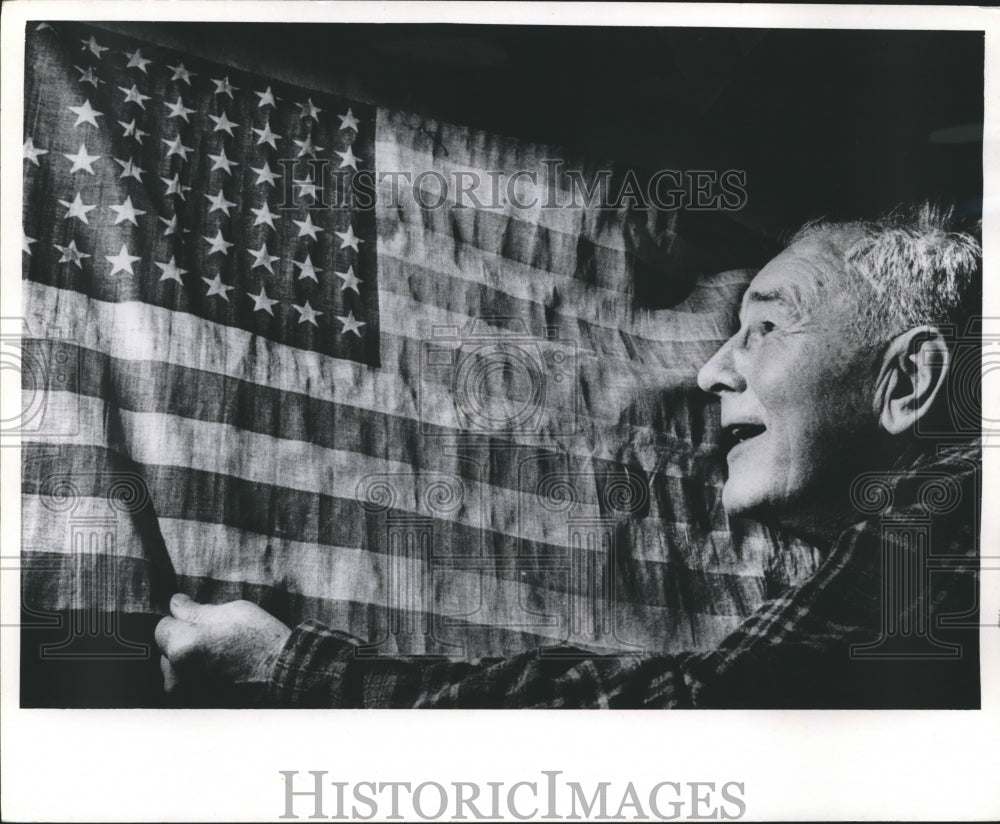 1965 Press Photo Charles H. Riley with 45 Star United States Flag from Bradford- Historic Images