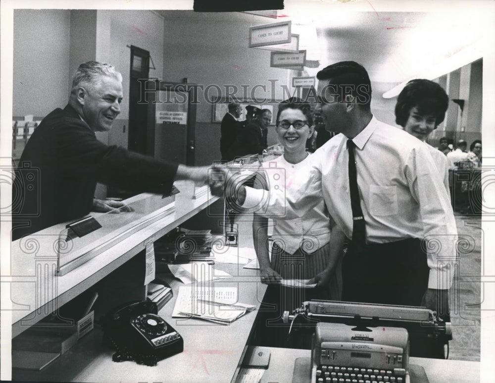 1964 Press Photo Raymond W. Fleming Congratulated After John Doe Charges Drop- Historic Images