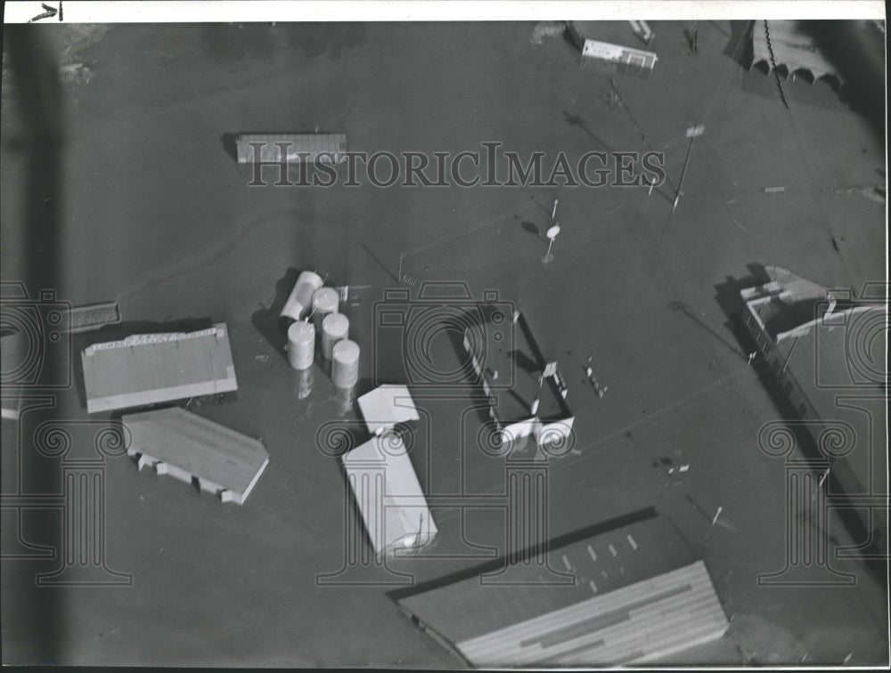 1941 Press Photo Chippewa River Flood Crest in Lumber Yard in Chippewa Falls- Historic Images