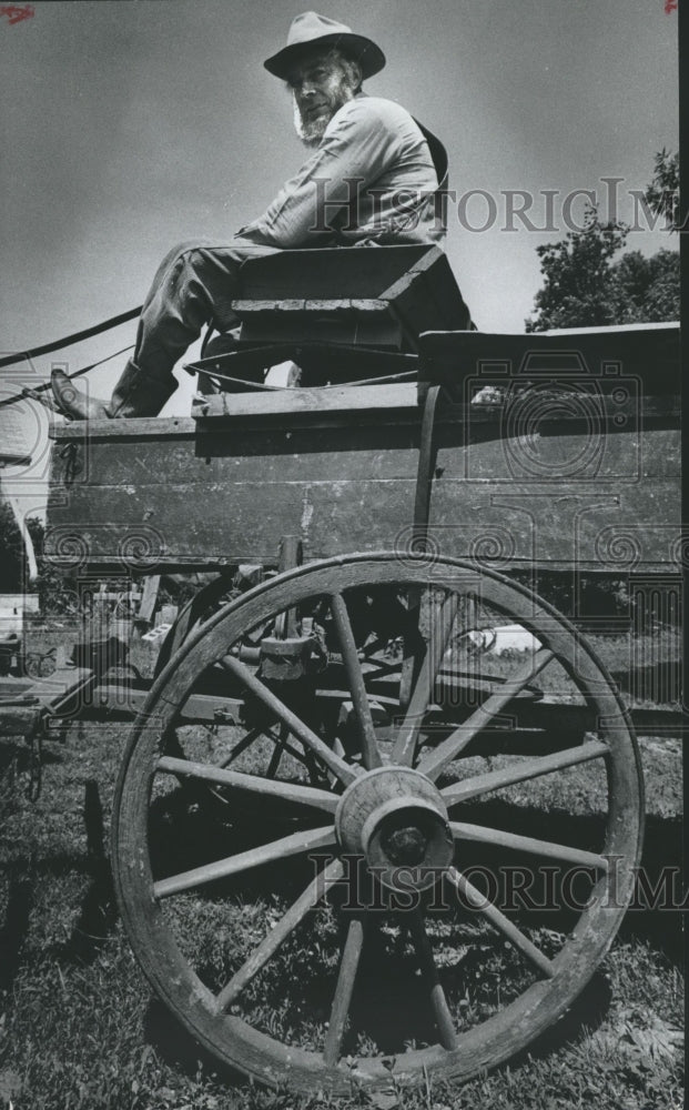 1979 Press Photo A farmer on a historic wagon made from parts of 11 wagons- Historic Images