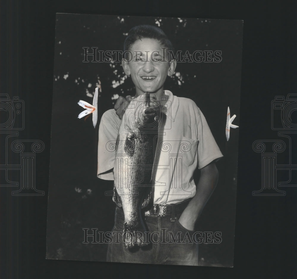 1951 Press Photo Edward Weber Holds Black Bass Caught in Milwaukee Lagoon- Historic Images