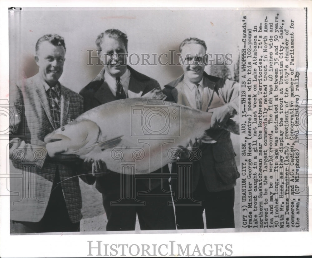 1961 Press Photo George Hees, Trade Minister with 102-pound Lake Trout, Canada- Historic Images