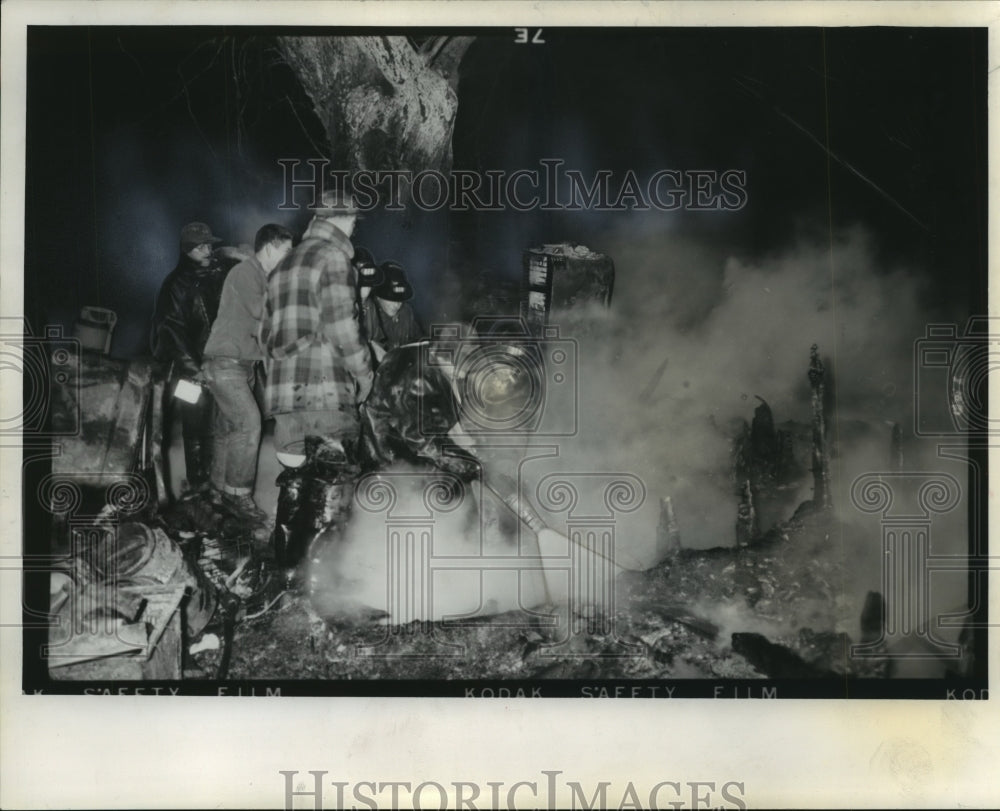 1956 Press Photo Group puts out fire that destroyed the home of Wisconsin couple
