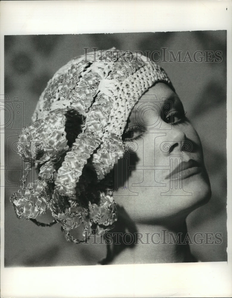 Load image into Gallery viewer, 1975 Press Photo A snug, embroidered helmet from Albrizio's spring/summer wear
