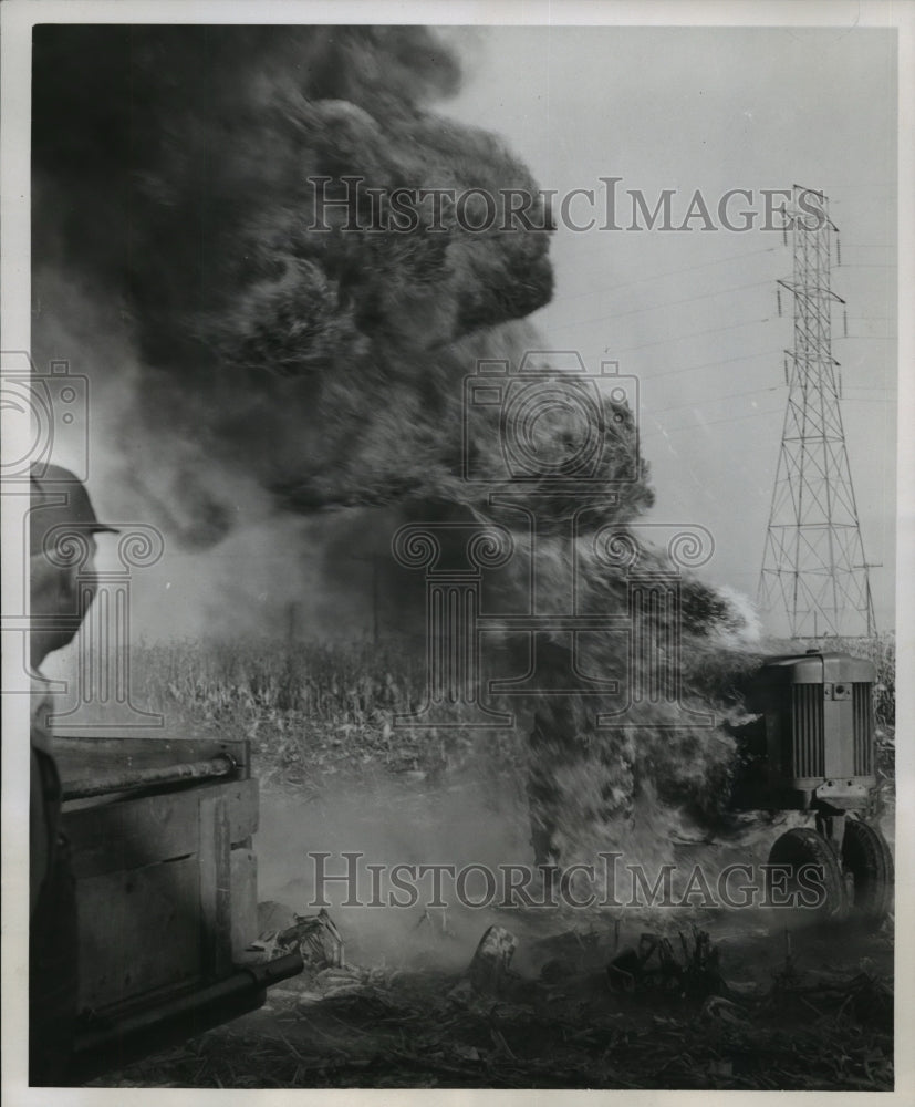 1956 Press Photo Tractor engulged in Flames on farm of James Fish, Wisconsin- Historic Images