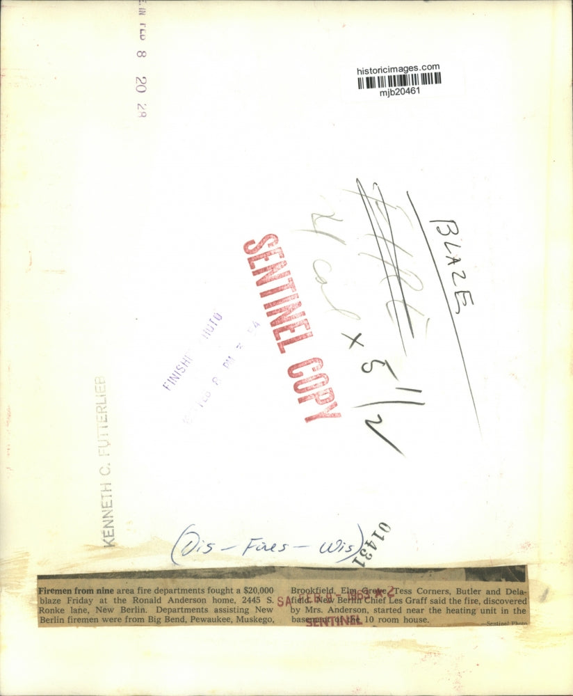 1963 Press Photo Firemen fight a blaze at a New Berlin house fire, Wisconsin