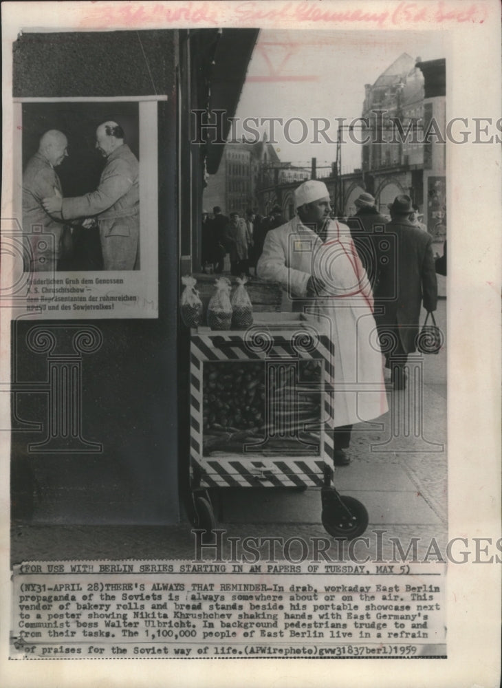 Load image into Gallery viewer, 1959 Press Photo Baked Goods Vendor on East Berlin Street, Germany - mjb22597
