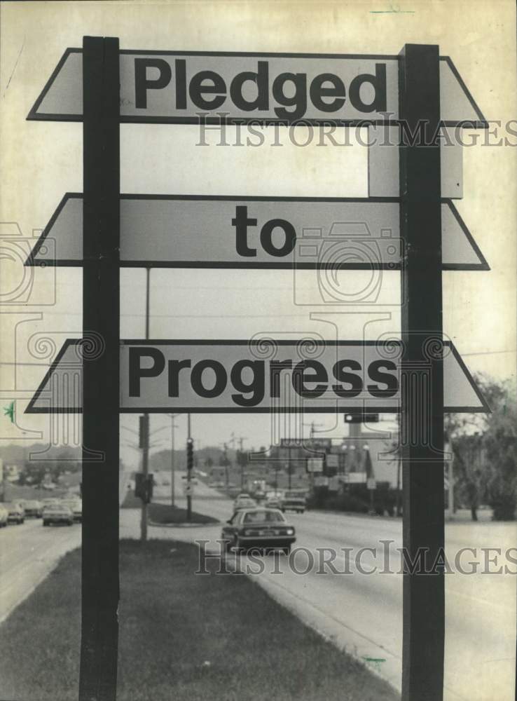 1982 Press Photo &quot;Pledged to Progress&quot; Sign, Greenfield, Wisconsin - mjb24098- Historic Images