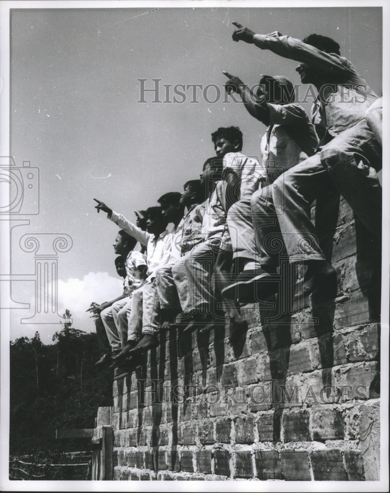 1961 Press Photo Boys Sitting on Wall in Juanjui Near Air Strip in Peru- Historic Images