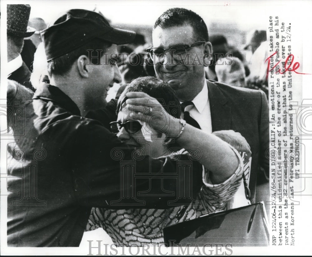 1968 Press Photo Member of USS Pueblo greets parents after return - mjb25943- Historic Images
