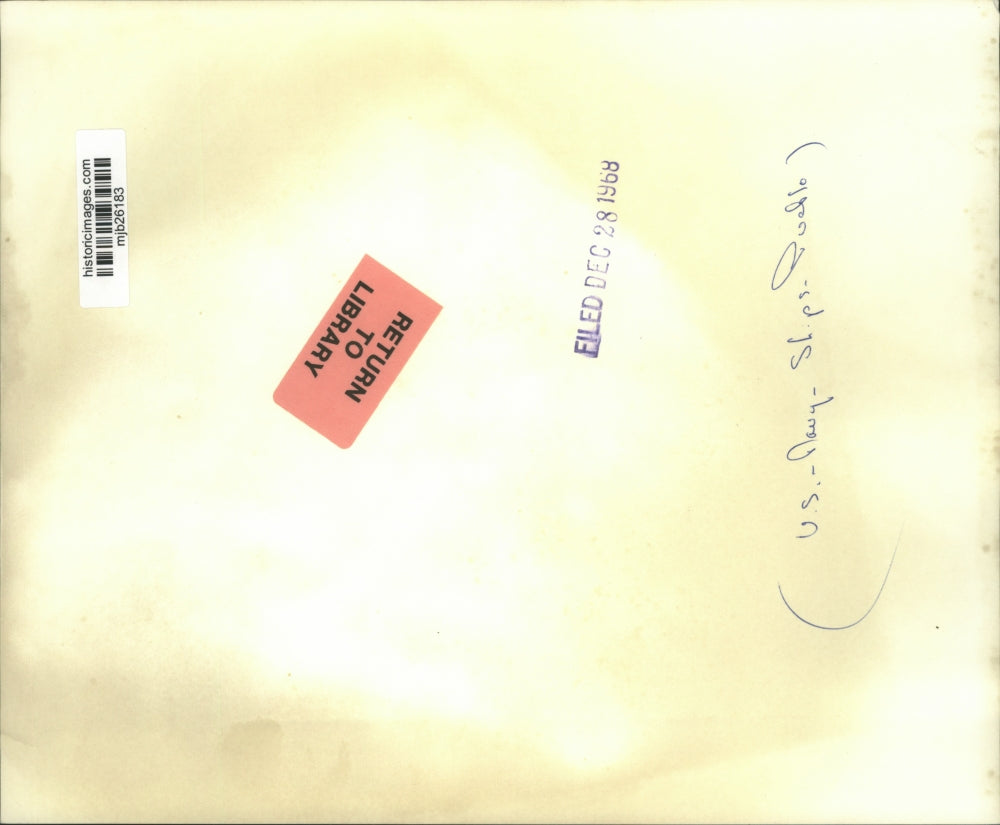 1968 Press Photo Pueblo crewman give thumbs up while boarding plane, Seoul