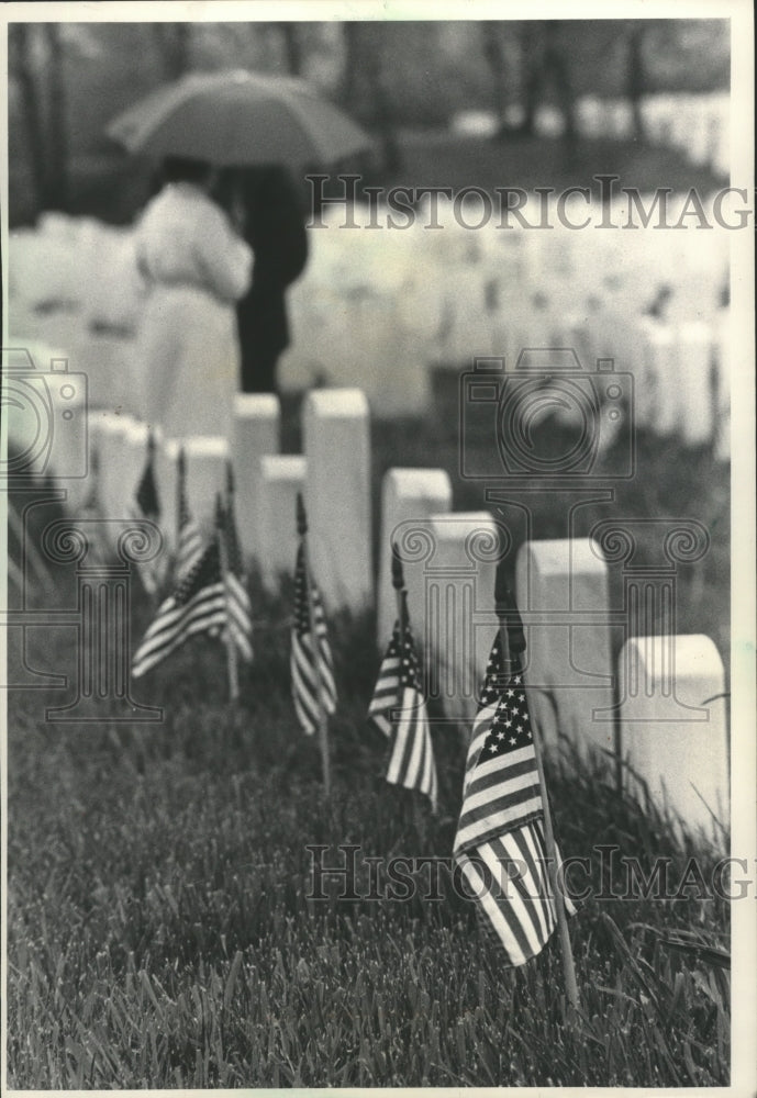 1965 Press Photo Graves decorated with flags at Wood National Cemetery