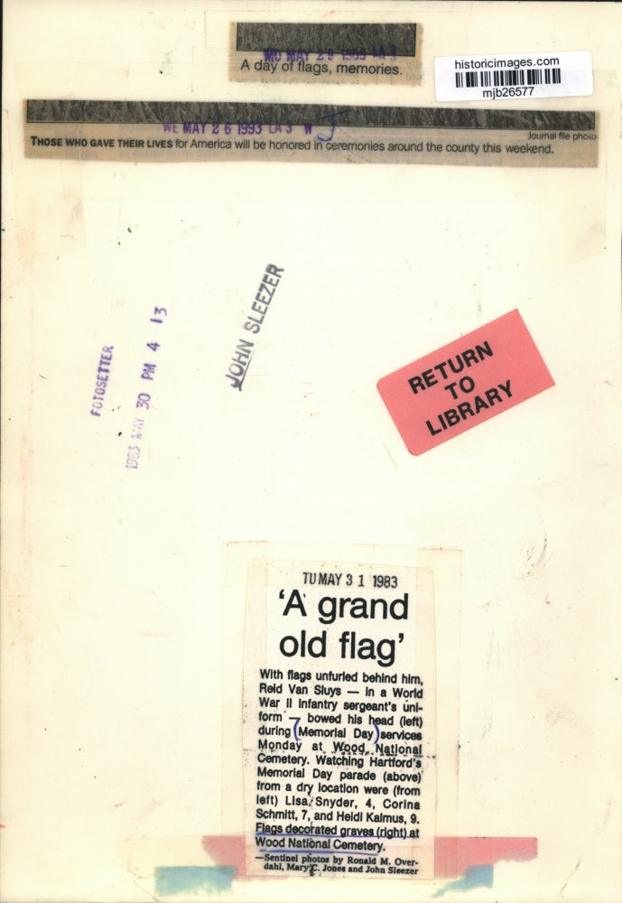 1965 Press Photo Graves decorated with flags at Wood National Cemetery