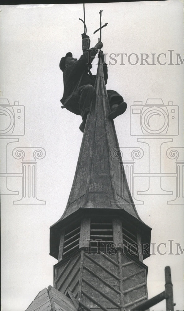 Load image into Gallery viewer, 1965 Press Photo Arthur Sukowatey Places Cross on Joan of Arc Chapel, Milwaukee
