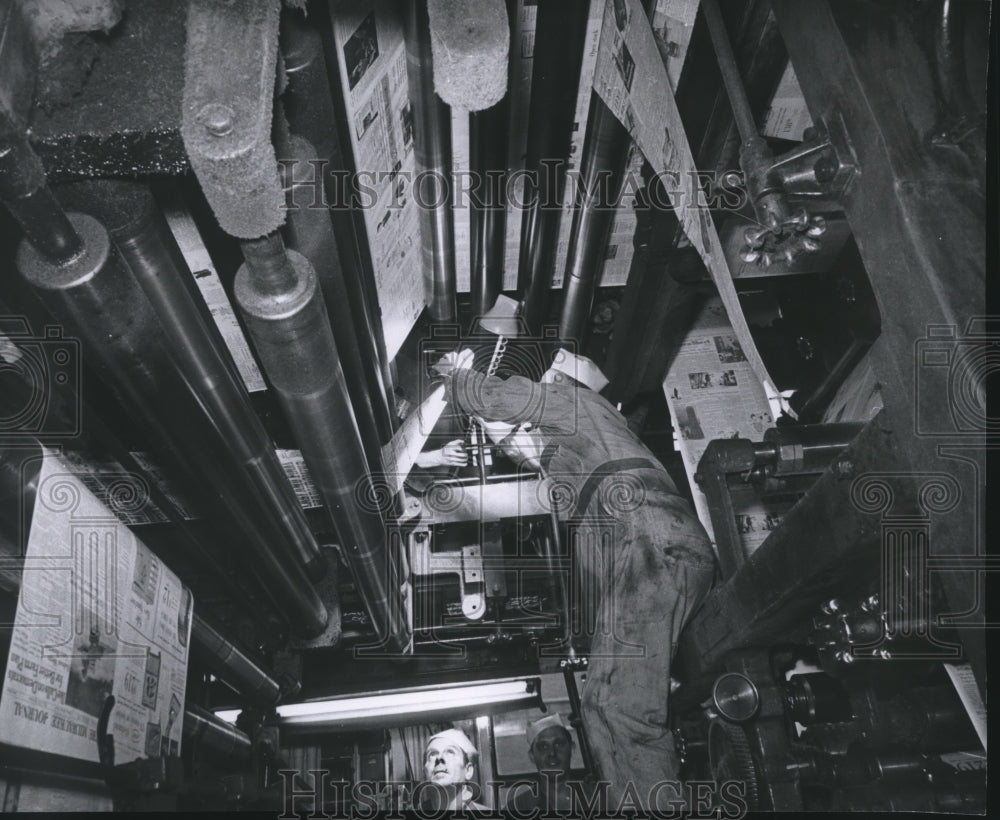 1960 Press Photo Worker Puts Paper on Press in The Milwaukee Journal Press Room