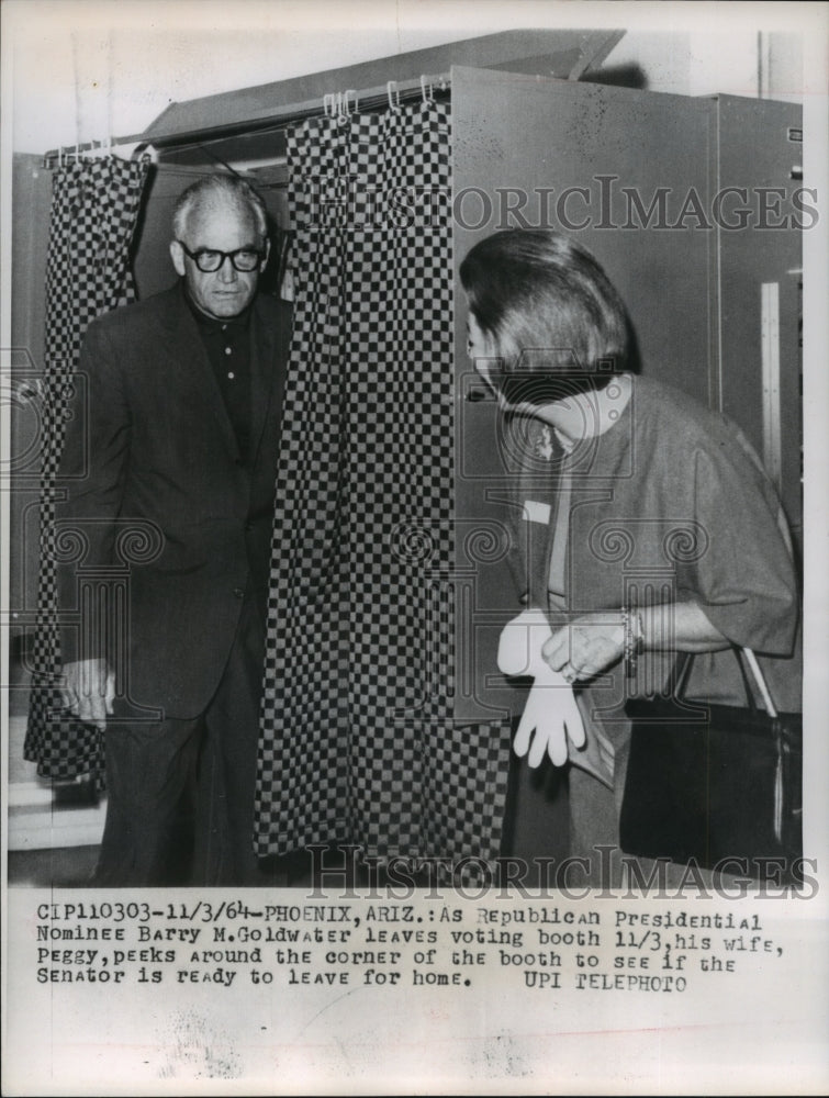 Load image into Gallery viewer, 1964 Press Photo Barry Goldwater and wife, leave voting booths, Phoenix, Arizona
