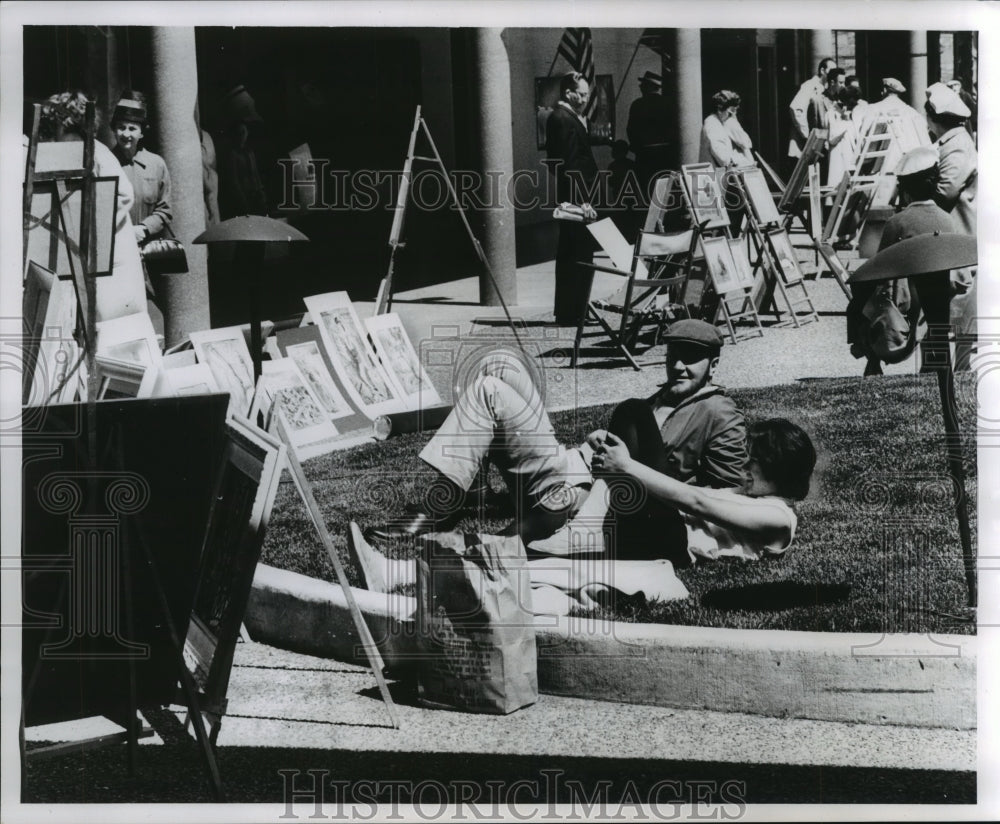 1961 Press Photo Marvin Goes and other laying on grass at art fair, Wauwatosa