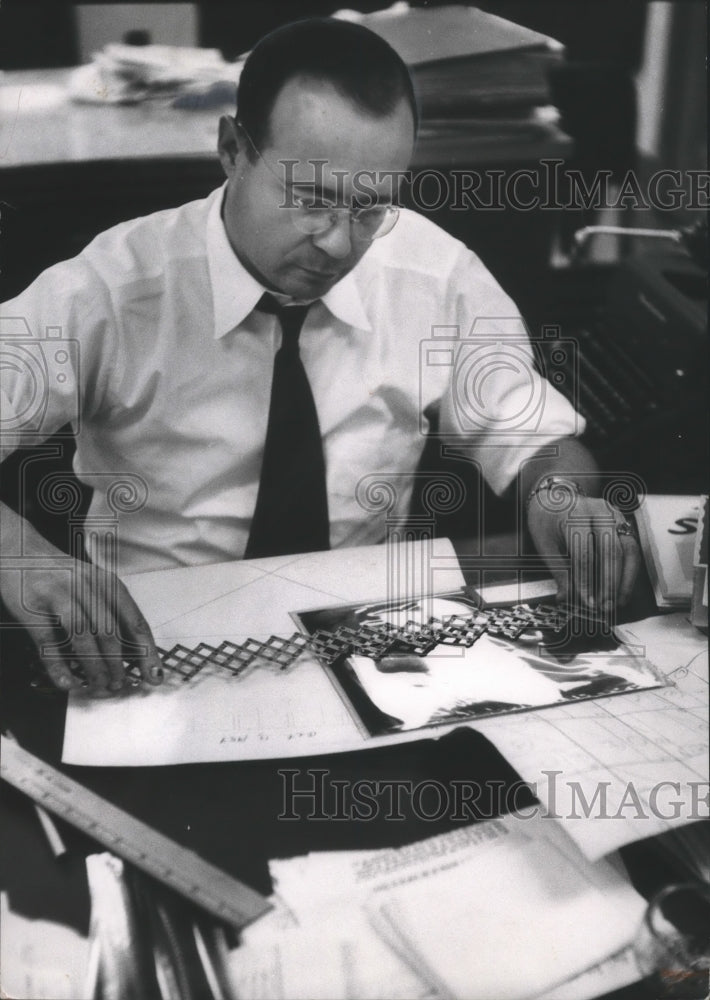 1954 Press Photo Roto Editor Hyman Chester spends time on the Picture Journal.  - Historic Images