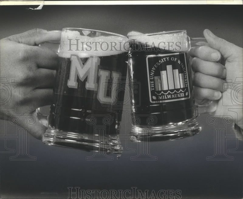 Load image into Gallery viewer, 1883 Press Photo Marquette and University of Wisconsin-Milwaukee Beer Mugs
