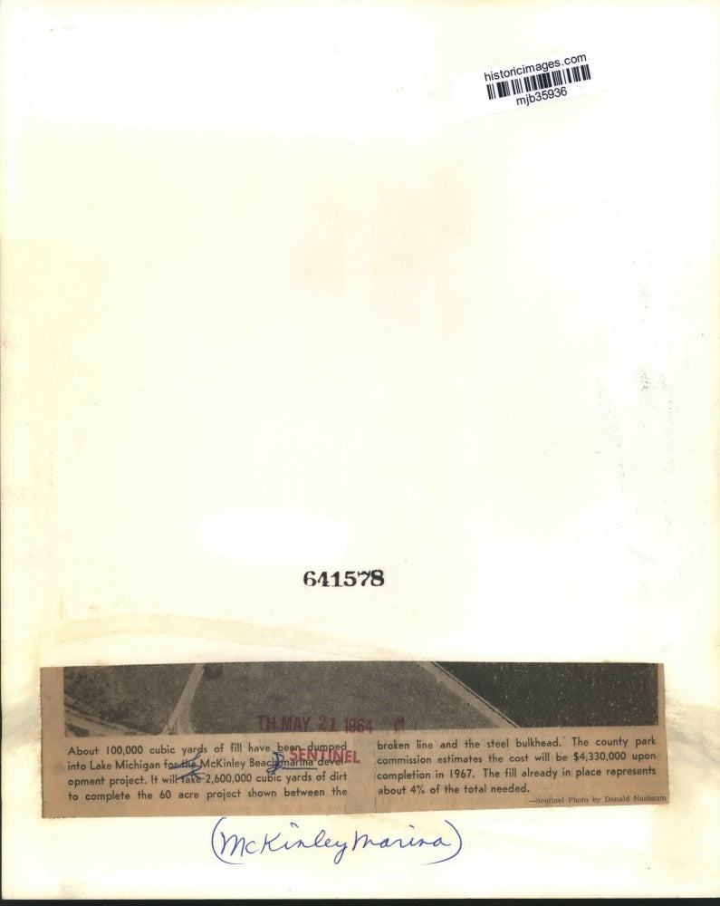 1964 Press Photo Dirt dumped into Lake Michigan, McKinley Beach marina project.
