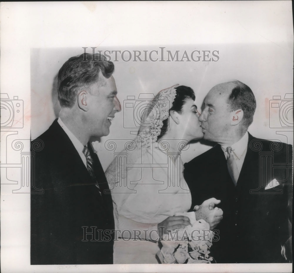 1957 Press Photo Adlai Stevenson kisses cousin Helen , with husband Gov Meyner- Historic Images