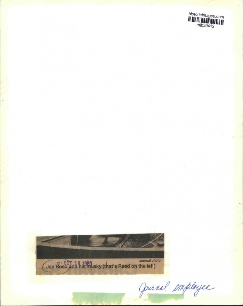 Load image into Gallery viewer, 1980 Press Photo Jay Reed, a Journal employee caught a Musky on the water
