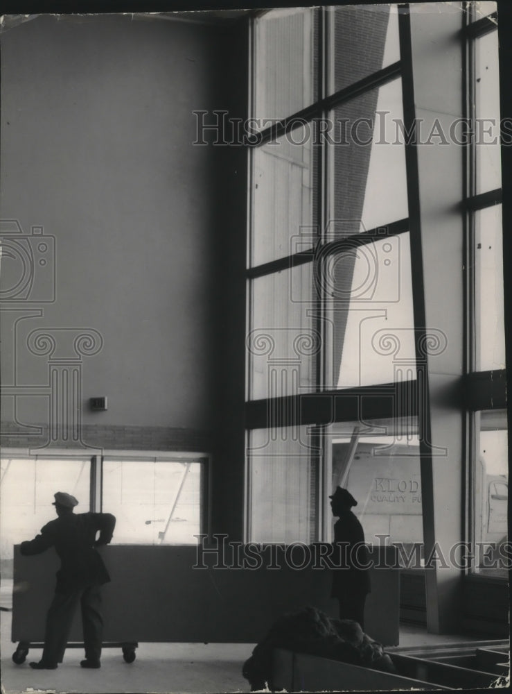 1955 Press Photo New furniture is moved into Mitchell Field airport terminal- Historic Images