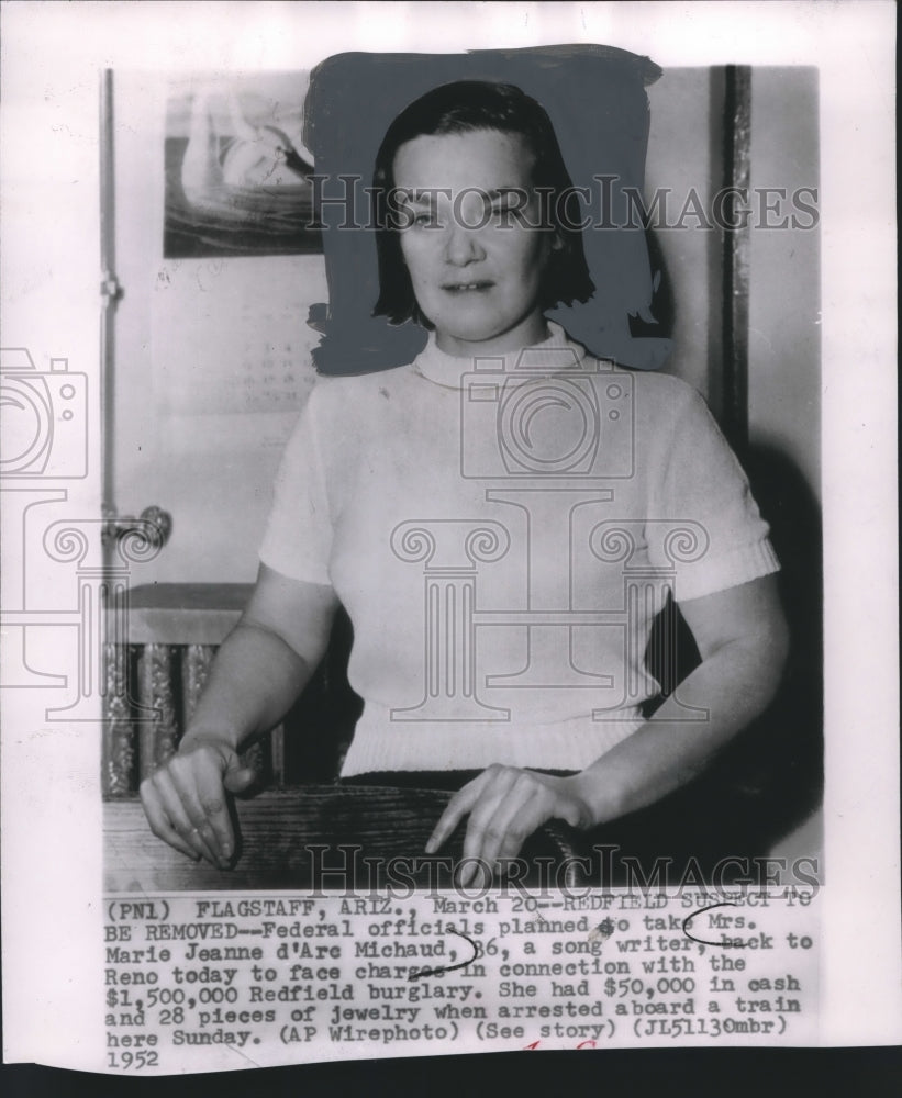 1952 Press Photo Federal officials take Marie Michaud to face charges in Reno.- Historic Images