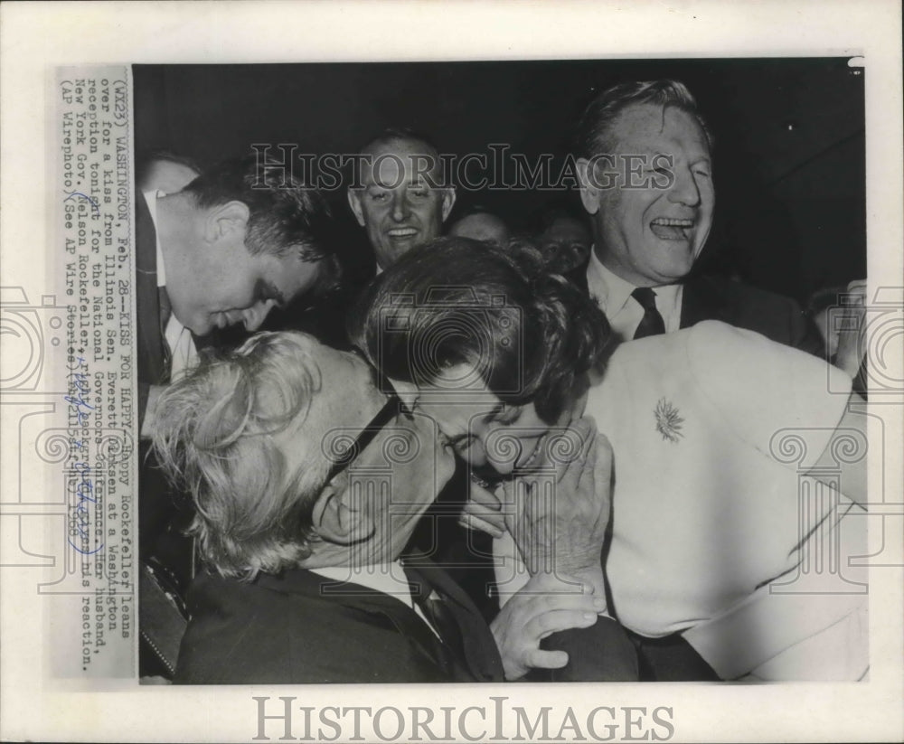 1968 Press Photo Happy Rockefeller receives a kiss from Senator Everett Dirksen.- Historic Images