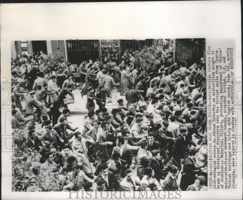 Load image into Gallery viewer, 1956 Press Photo Police trying to control rioters in Athens - mjb47139
