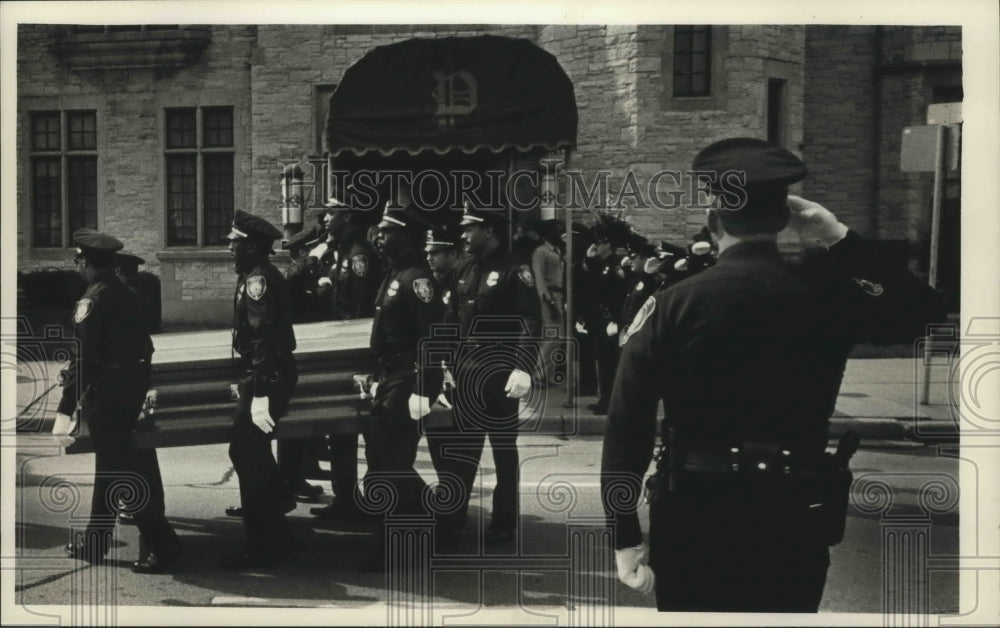 1987 Press Photo Officers carry Roger Anthony Sterling casket in Milwaukee- Historic Images